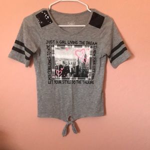 Grey shirt with a New York picture in the middle